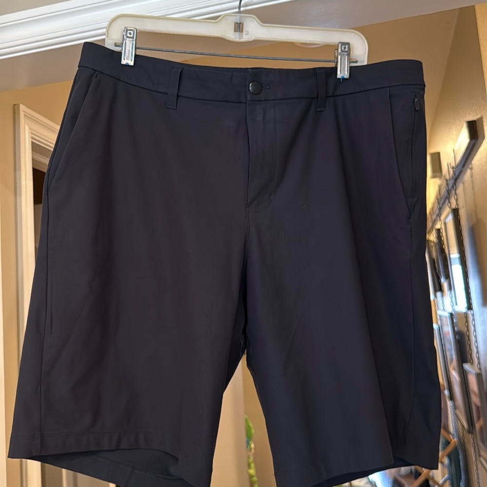 Men’s Lululemon Commision Relaxed-fit black 11” shorts, size 36